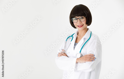 Female doctor with stethoscope looking at camera