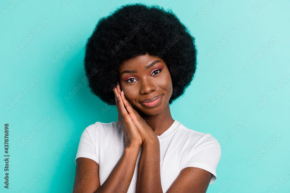 Photo of cute short hairdo brunette millennial lady hold hands wear white t-shirt isolated on cyan color background