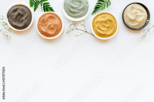 Clay mud cosmetic mask in bowl for spa beauty treatment