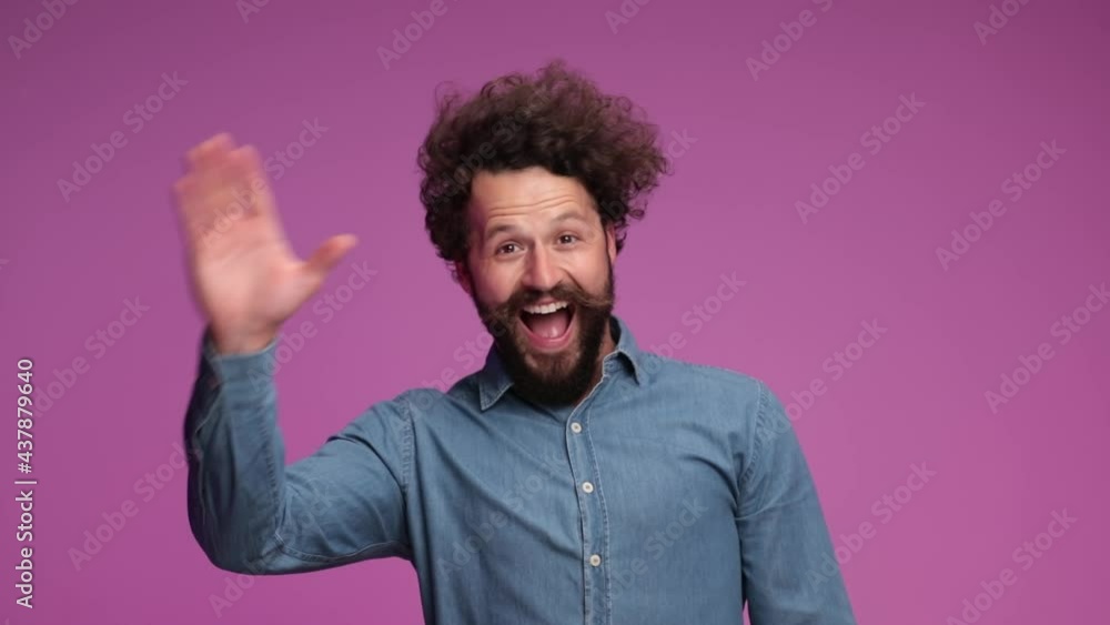 handsome casual man entering, smiling at someone and waving, walking out, entering again and fooling around from one side to another, pointing at the camera handsome casual man entering, smiling at someone and waving, walking out, entering again and fooling around from one side to another, pointing at the camera