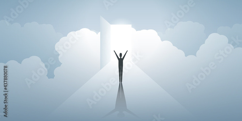 New Possibilities, Hope, Dreams - Business, Solutions Finding or Reaching Heaven Concept - Man Standing in Front of a Door in a Cloudy Sky with Bright Light at the End of the Road