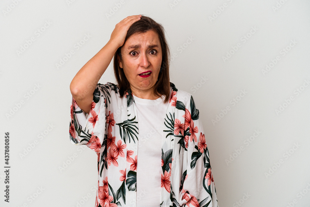 Middle age caucasian woman isolated on white background being shocked, she has remembered important meeting. Middle age caucasian woman isolated on white background being shocked, she has remembered important meeting.