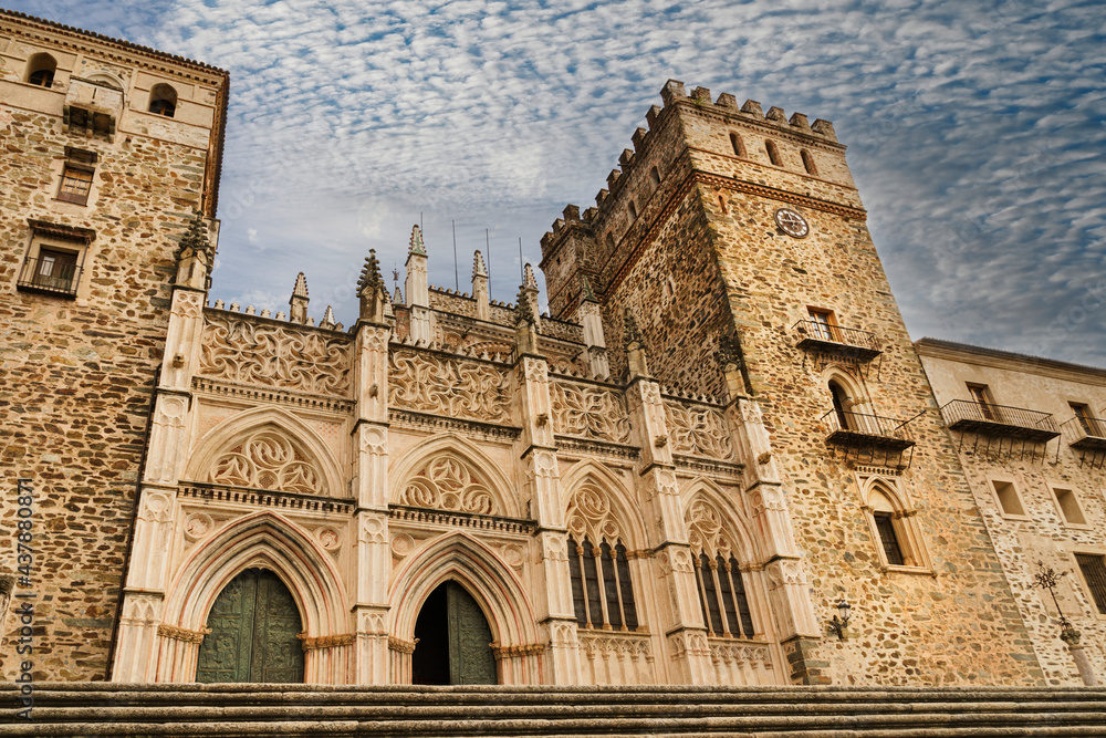 Main facade of the Mudejar Gothic Monastery of Guadalupe in Spain. World heritage