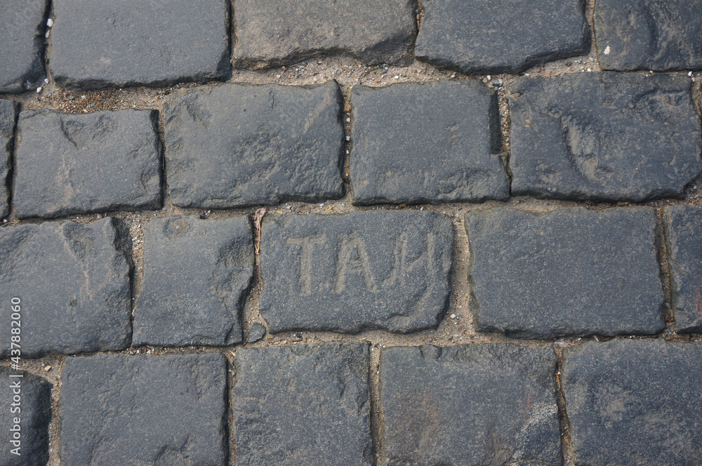Three carved letters on paving stones on Red Square. Moscow, Russia. Three carved letters on paving stones on Red Square. Moscow, Russia.
