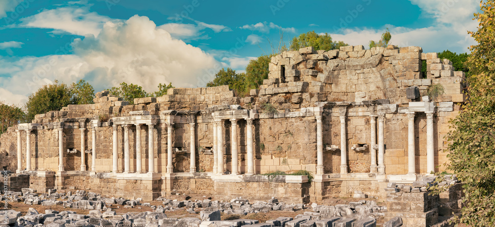Panoramic view of ruins of the columns of the Nymphaeum Fountain in the ancient Side in Manavgat county.  Antalya one of the most famous cultural tourism destinations. 