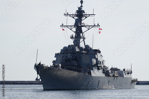 WARSHIP - Guided missile destroyer is maneuvering in the port photo
