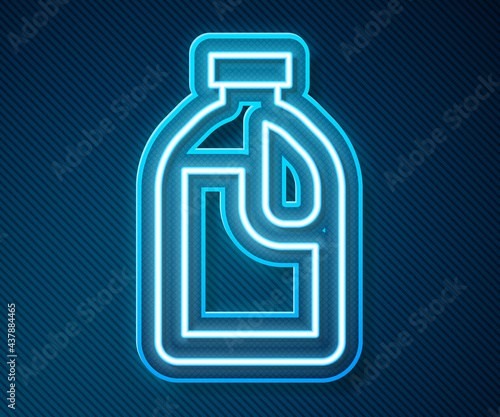 Glowing neon line Plastic bottle for laundry detergent, bleach, dishwashing liquid or another cleaning agent icon isolated on blue background. Vector