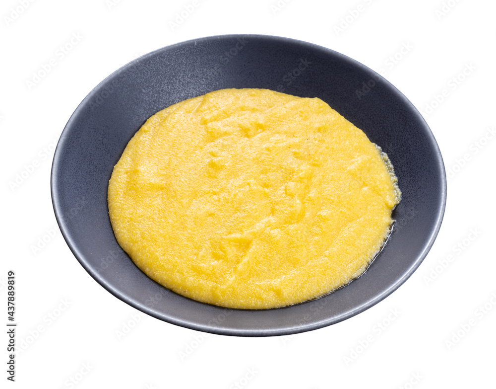 cooked polenta in gray bowl isolated on white cooked polenta in gray bowl isolated on white