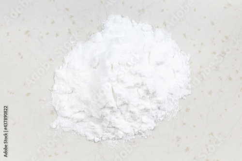 top view of pile of potato starch close up on gray