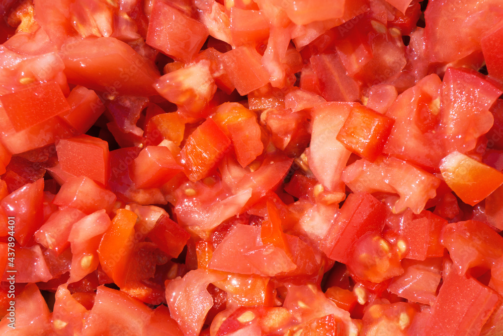 Tomato salad background. Red pepper salad texture. Healthy red salad background. Fit dinner texture. Raw vegetables mix. Closeup salad in bowl. Summer lunch background.