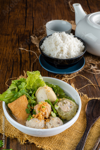 Yong tau foo , yong tau fu or Liong Tahu (In Indonesia). is a Hakka Chinese cuisine consisting primarily of tofu filled with ground meat mixture or fish paste.