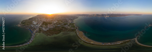 Novorossiysk, Russia. The central part of the city. Sudzhukskaya Spit. Sunset. Panoarma 360. Aerial view photo