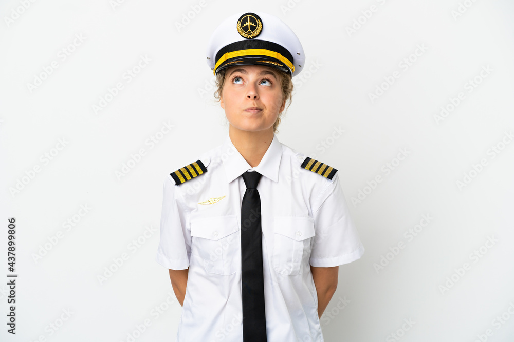 Airplane blonde woman pilot isolated on white background and looking up Airplane blonde woman pilot isolated on white background and looking up