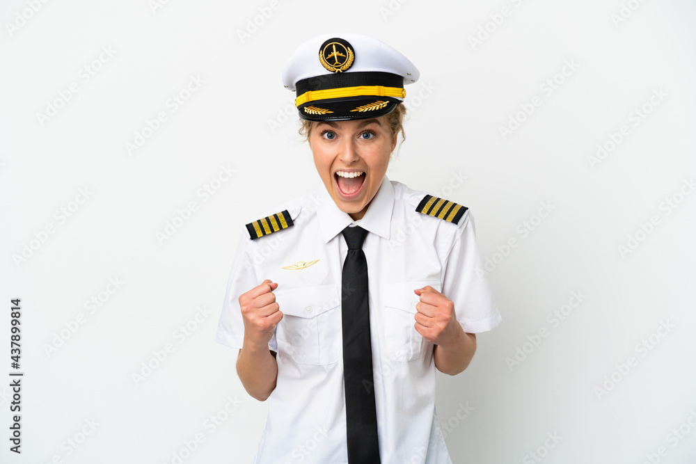 Airplane blonde woman pilot isolated on white background celebrating a victory in winner position Airplane blonde woman pilot isolated on white background celebrating a victory in winner position