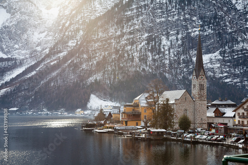 Hallstatt, Austria Dec 26,2017:scen of church and Hallstatt city in winter times cover with snow photo