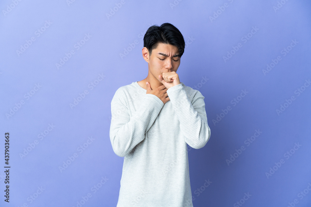 Young Chinese man isolated on purple background coughing a lot Young Chinese man isolated on purple background coughing a lot