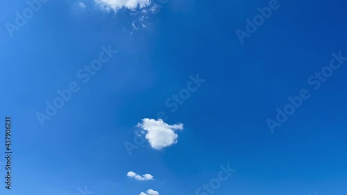 White cloud passing by in the blue sky. Beauty concept of nature. HD video shooting