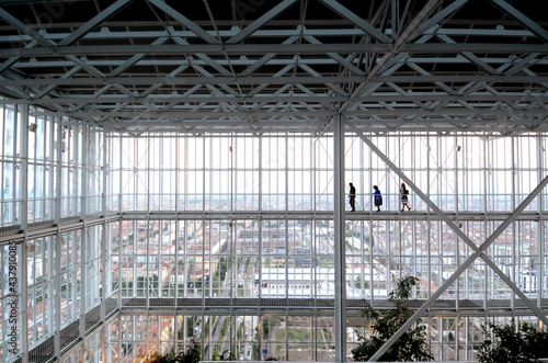 Wallpaper Mural Silhouettes of people inside a skyscraper of an Italian bank in the center of Turin where there is a coffee that makes aperitifs much loved by Torino's gourmet Torontodigital.ca