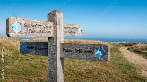 The South Downs way, Sussex, UK. A signpost giving directions to the 100 mile walking route between Winchester and Eastbourne, South East England. photo