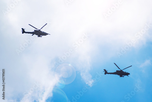 Apache helicopters in flight. Helicopters belonging to the American Army. Romania, Targu Jiu. June, 07, 2021 photo