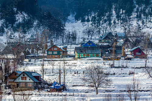 Snow-filled farm villages and rivers on the way from Srinagar to Sonmarg and Gulmarg