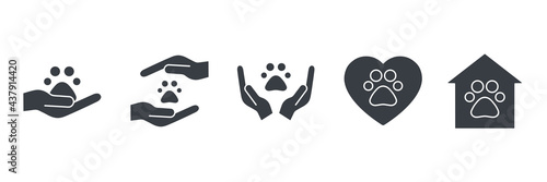 Paws print and people hands icon collection. Veterinary clinic sign. Animal rights concept. Charity and voluntary black silhouette symbols set. Vector isolated on white.