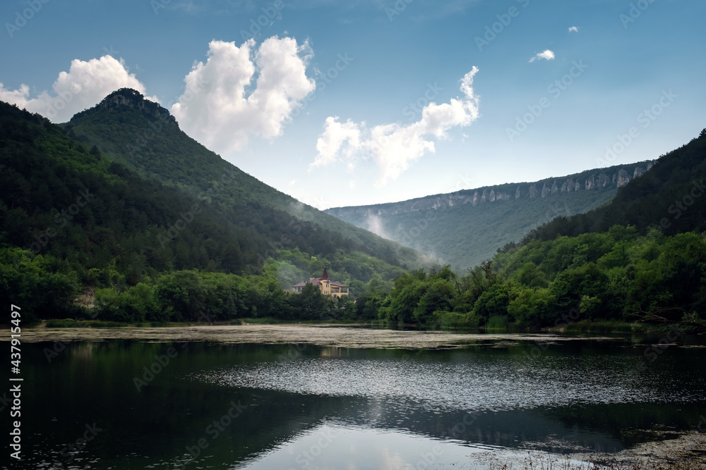 Dark and Foggy lake with hills. after the rain Dark and Foggy lake with hills. after the rain