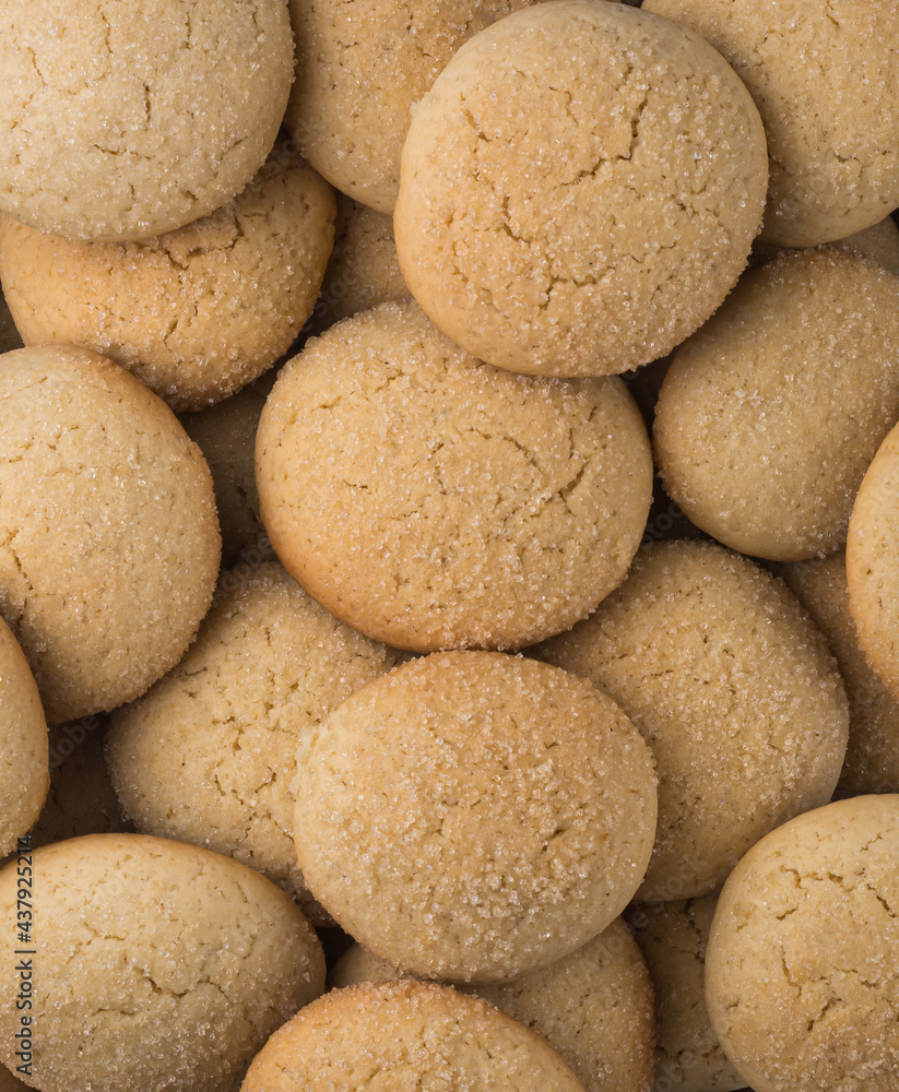 sugar cookies, consist of butter, flour and sugar, closeup view of baked sweet biscuits background, taken from above sugar cookies, consist of butter, flour and sugar, closeup view of baked sweet biscuits background, taken from above