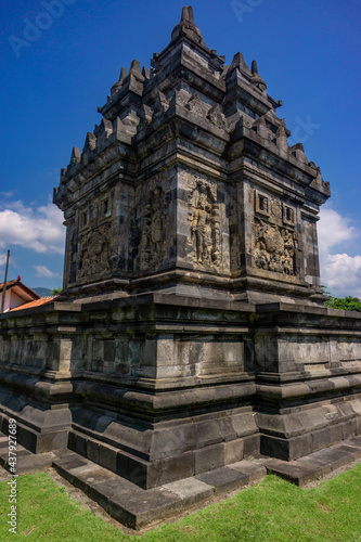 фотографія Pawon Temple and its reliefs in Magelang, Central Java, Indonesia