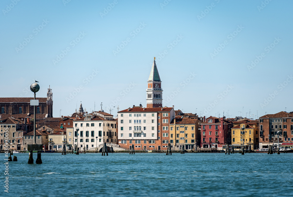 Urban Skyline of Venice with the Bell Tower of San Marco (Campanile), and the Basilica and Cathedral (St. Mark the evangelist), seen from the lagoon, UNESCO world heritage site, Veneto, Italy, Europe.