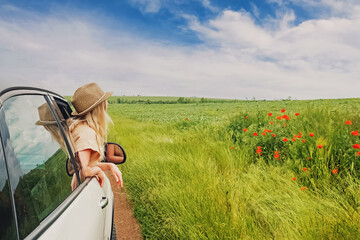 Young woman in a hat enjoying summer vacation.