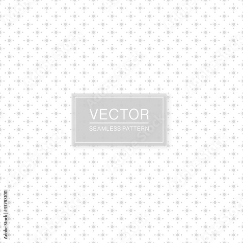 Stylish seamless dotted pattern - simple minimalistic design. White and grey decorative texture. Abstract delicate background