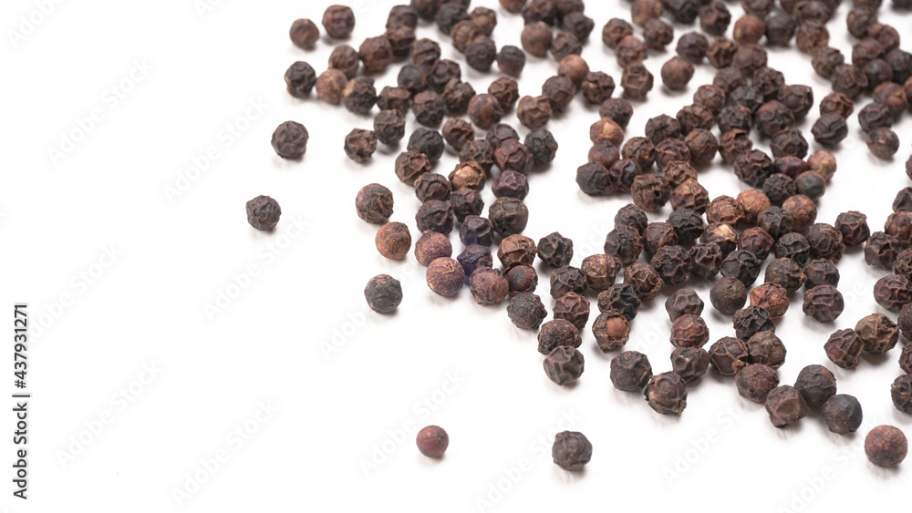 Group of Organic Black pepper isolated on white background. Selective focus and Top view (Flat Lay) Group of Organic Black pepper isolated on white background. Selective focus and Top view (Flat Lay)