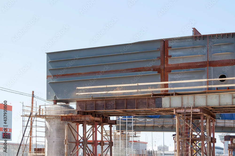 close-up view of road bridge under construction. connection of steel powerful straight crossbar, bridge connection, metal architecture close-up view of road bridge under construction. connection of steel powerful straight crossbar, bridge connection, metal architecture
