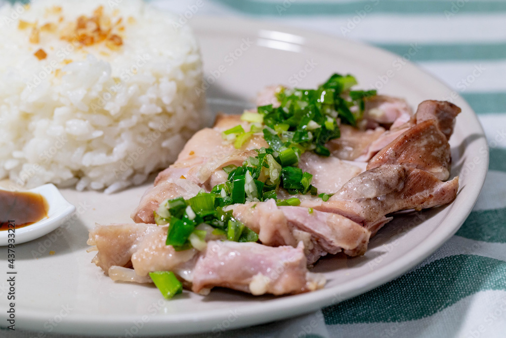 Handmade Hainanese chicken rice.Steam chicken with rice.