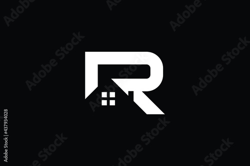 Logo design of R in vector for construction, home, real estate, building, property. creative elegant Monogram. Premium Business home logo icon. White color on black background.