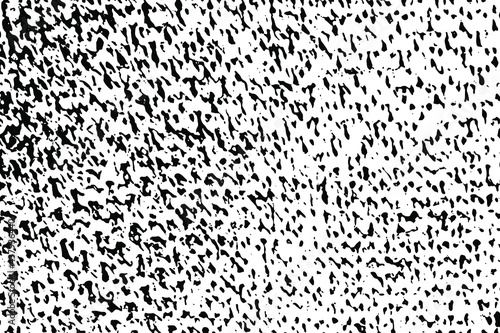 Grunge texture of knitted fabric. Monochrome mottled background of close-up knitwear with spots, halftone and graininess. Overlay template. Vector illustration
