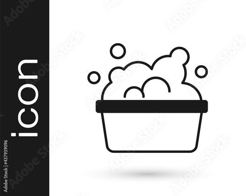 Black Plastic basin with soap suds icon isolated on white background. Bowl with water. Washing clothes, cleaning equipment. Vector