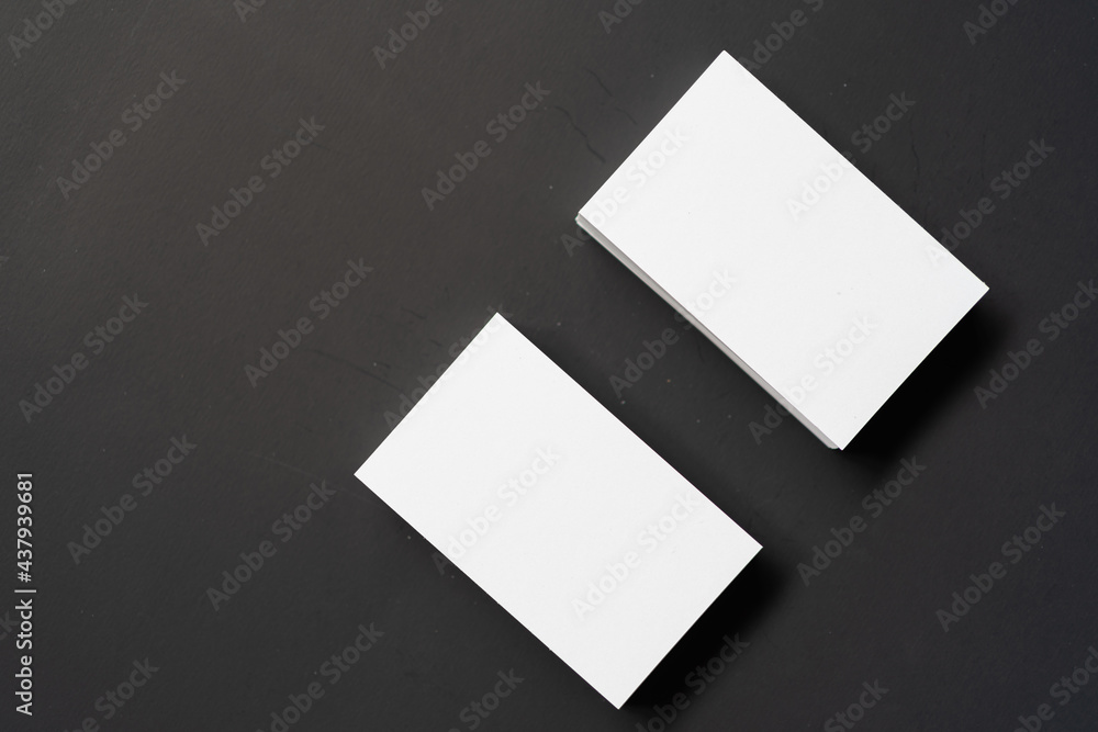 Pile of white blank space business name cards stack template for advertise and marketing on wooden texture background, clipping path for insert your banner text design for present the company brand Pile of white blank space business name cards stack template for advertise and marketing on wooden texture background, clipping path for insert your banner text design for present the company brand