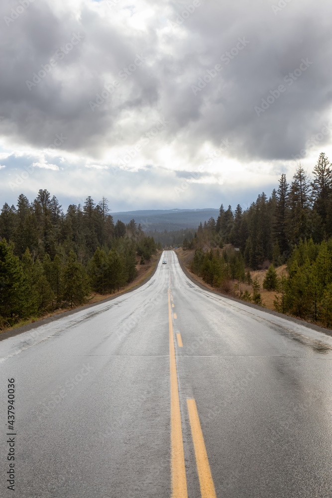 Scenic Road in the country side during a rainy stormy day. Taken between Merritt and Kamloops, British Columbia, Canada.