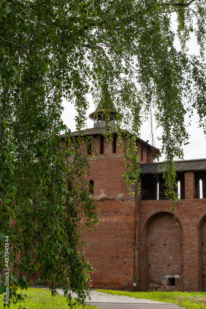 Wall and tower of red brick of the medieval fortress Kolomna Kremlin in the Moscow region