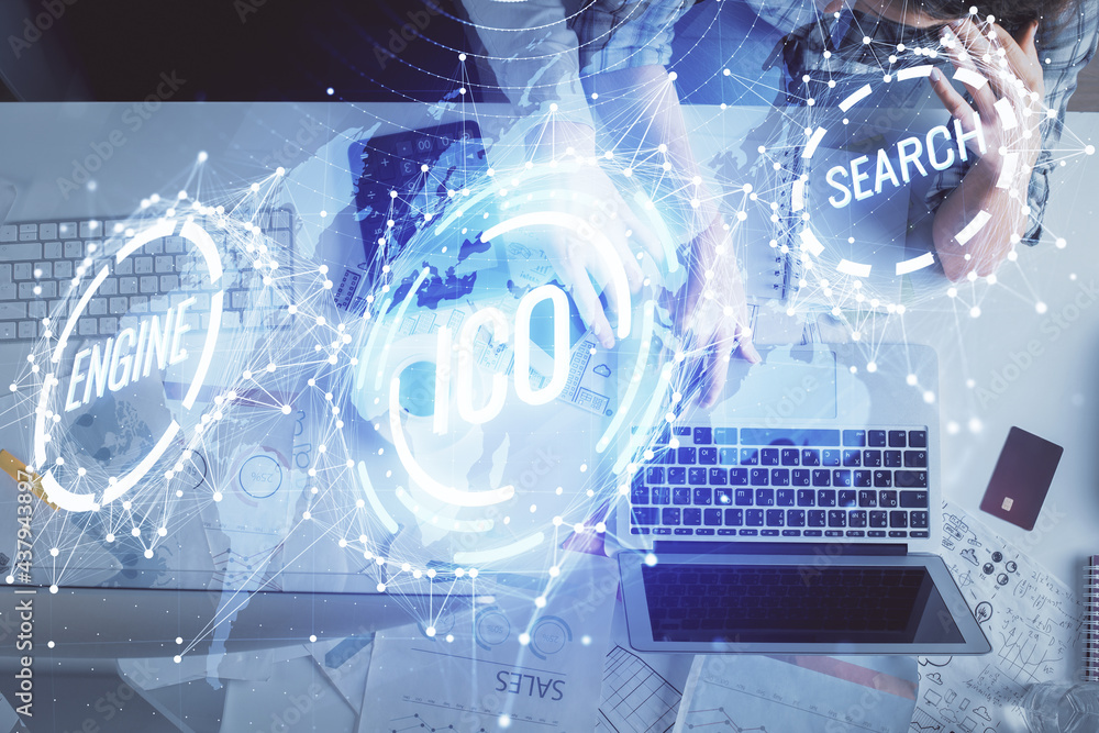 Double exposure of man and woman working together and crypto theme hologram drawing. Computer background. Blockchain concept. Top View. Double exposure of man and woman working together and crypto theme hologram drawing. Computer background. Blockchain concept. Top View.