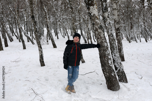 Child in birch grove on Ai-Petri mountain peak