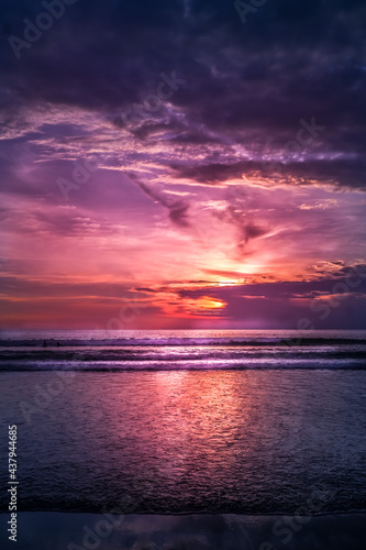 Purple sunset at the beach © Garuda