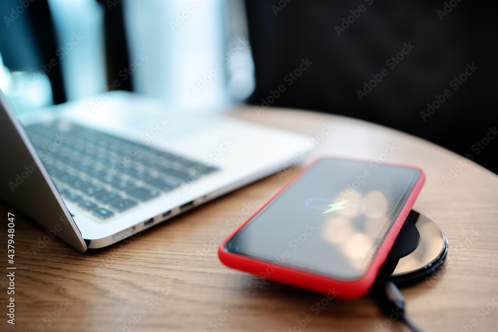 smartphone with wireless fast charger pad, digital device gadget.. smartphone with wireless fast charger pad, digital device gadget..