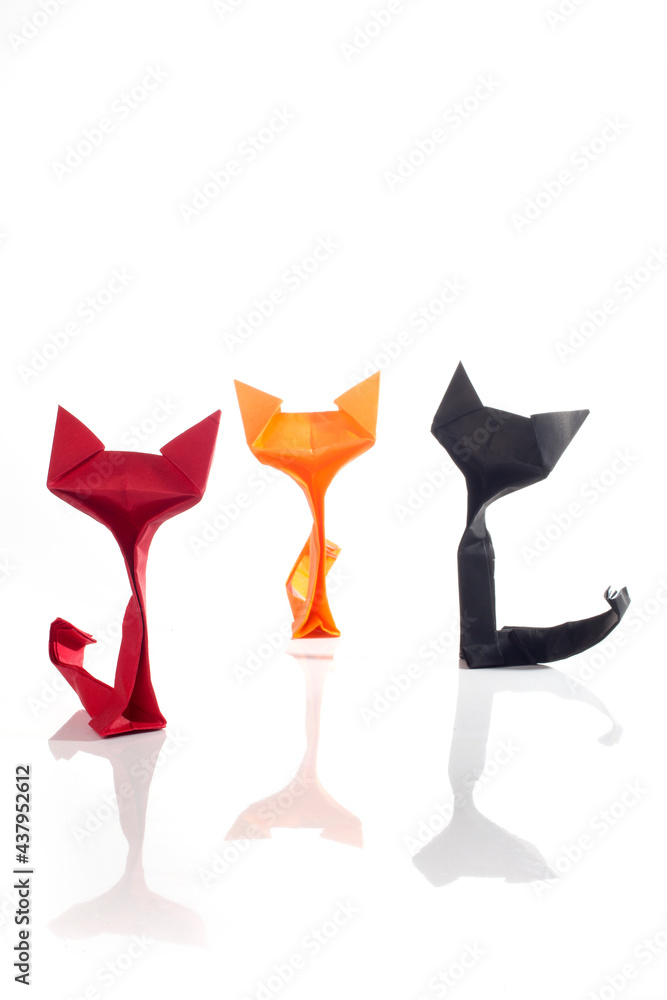Origami cats over white background Origami cats over white background