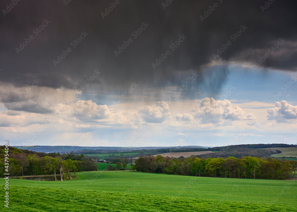 Ominous rain clouds looking south east over countryside in South Yorkshire Ominous rain clouds looking south east over countryside in South Yorkshire