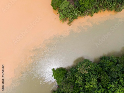 Meeting of water of two rivers called Doce and Pequeno, in Linhares city, Brazil.