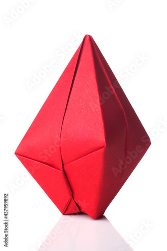 A origami balloon made of colored paper isolated on white background.
