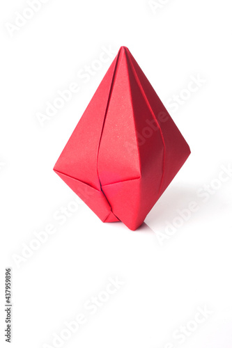 A origami balloon made of colored paper isolated on white background.